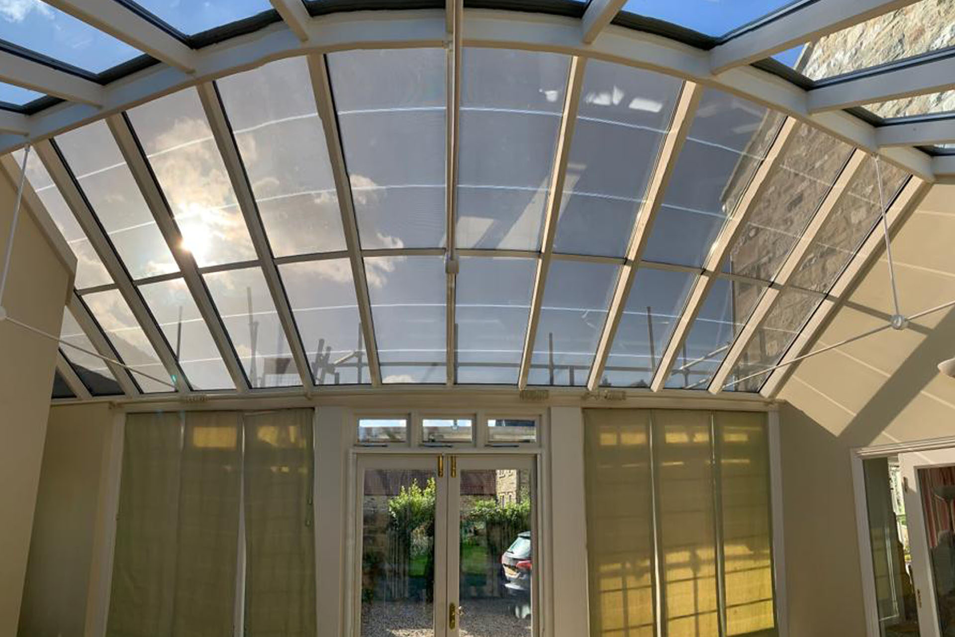 Semi-transparent solar glass garden canopy